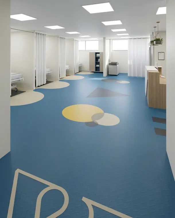 Render de urgencias pediátricas con piso de colores